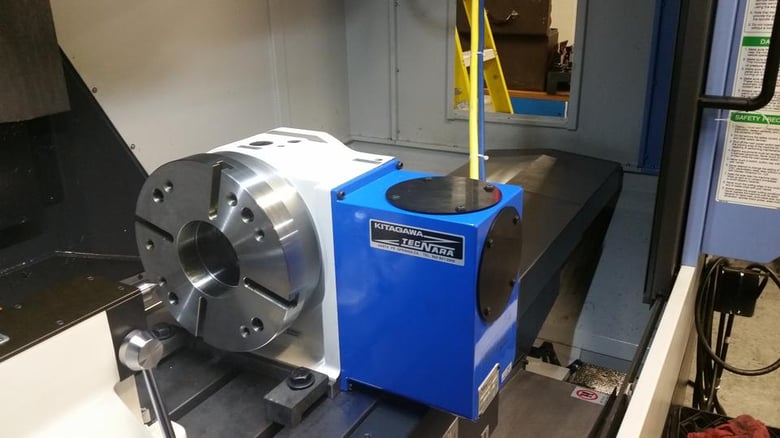 Doosan Mynx 5400 integrated with a Kitagawa MR-250R.j-max rotary table